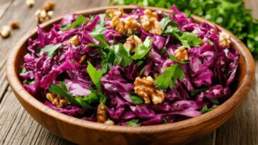 Vibrant Red Cabbage Recipe With Nuts And Fresh Herbs Displayed On A Rustic Table For The Holiday Celebration