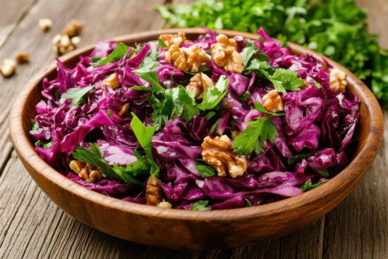 Vibrant Red Cabbage Recipe With Nuts And Fresh Herbs Displayed On A Rustic Table For The Holiday Celebration